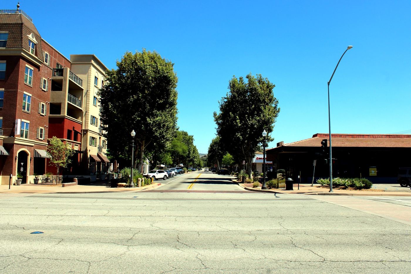 Historic Main Street storefronts and tree-lined street in Old Town Newhall, Santa Clarita, CA